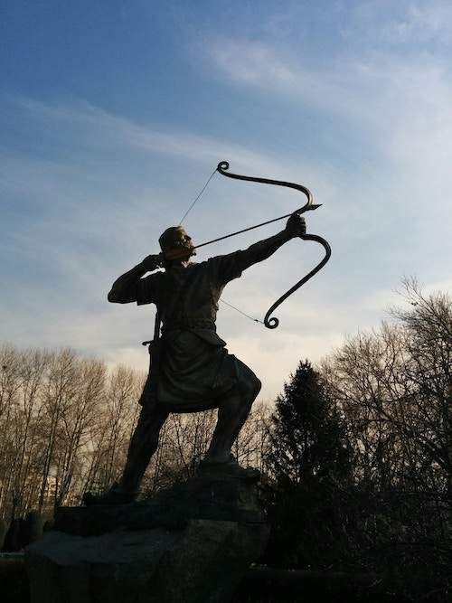 archery statue with bow and arrow silohuette