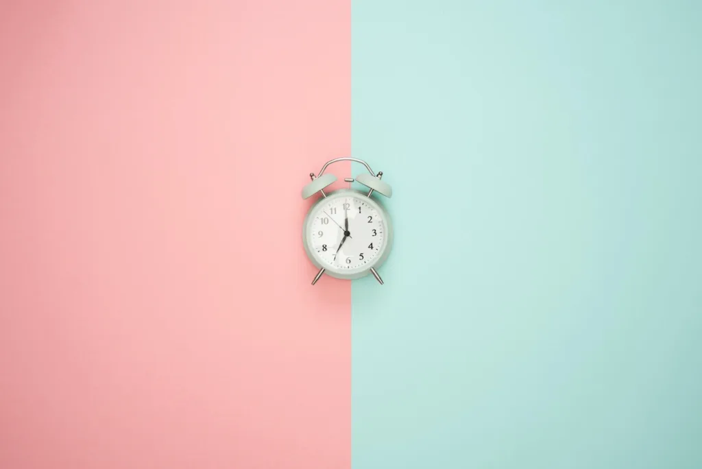 clock with pink and blue background