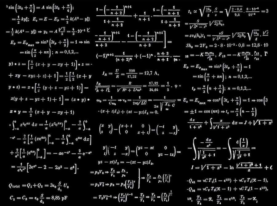 a chalkboard of difficult math functions with inflection points